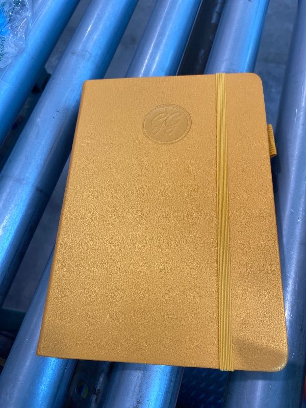 Photo 1 of *USED*
GoGirl Food Journal & Wellness Planner –– Diet & Fitness Diary – Nutrition Journal with Meal, Exercise & Weigh Loss Tracker, A5 (Amber Yellow)