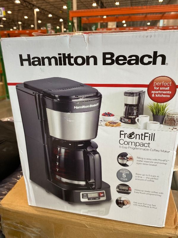 Photo 1 of *MINOR DAMAGE - USED*
Hamilton Beach 5 Cup Drip Coffee Maker with Easy FrontFill Basket, Compact Design, Programmable Clock, Glass Carafe, Auto Pause and Pour, Black & Stainless Steel (46111)