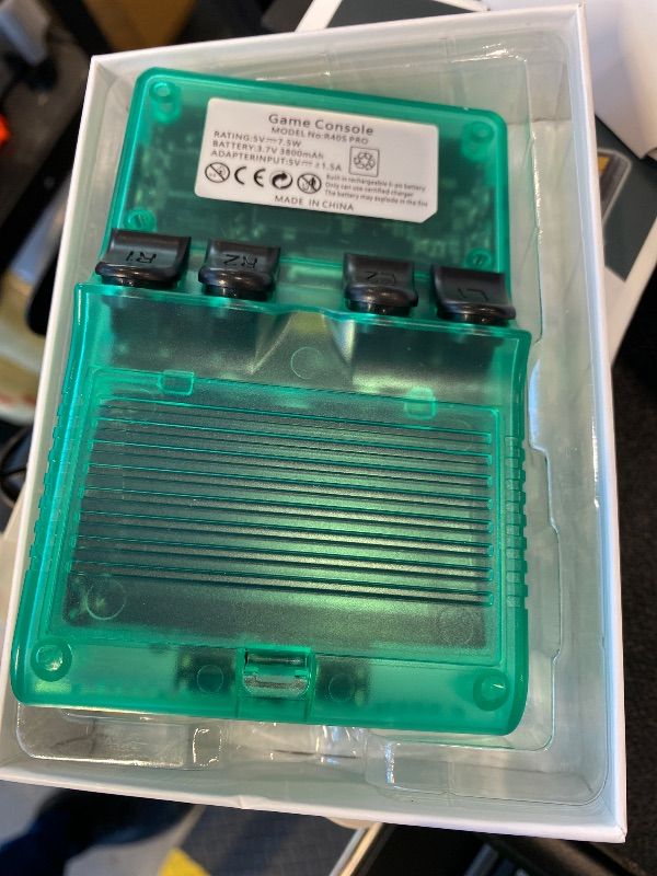 Photo 1 of ***MISSING SD CARD*** *UNTESTED*
R40S Retro Game Console - 3.5 Inch IPS Screen, 256G Extra Large Memory, Portable Pocket Video Player, Linux System, Travel Essentials, Perfect for Halloween (Transparent Green 256G)