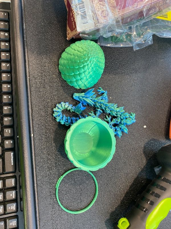 Photo 1 of ***MAJOR DAMAGE*** ***READ CLERK NOTES*** Small Dragon Eggs with Dragon Inside, 3D Printed Surprise Funny Gifts for Kids, Articulated Dragon Fidget Toys for Adults, Executive Desk Toys Office Room Décor (Christmas Green)