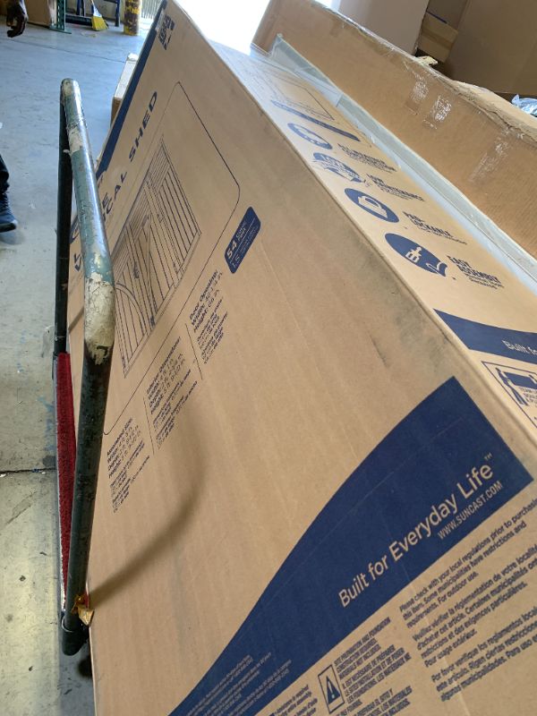 Photo 1 of Suncast Outdoor Storage Shed, Water Resistant Resin Vertical Outdoor Storage Cabinet for Patio, Garden Tools, Cushions, & Equipment, Weatherproof Multi-Wall Design, 54 cu. ft., Made in USA