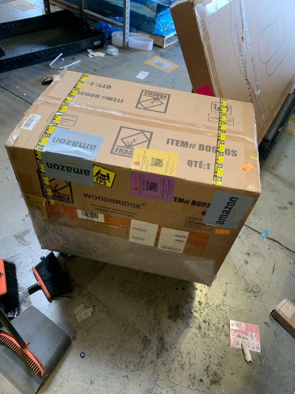 Photo 1 of WOODBRIDGE Smart Toilet 1.28 GPF Dual Flush, Auto Open & Close, Auto Flush, Foot Sensor,1000 Gram MaP Flushing Score,Movement Drying,Heated Seat,ADA Chair Height and Cleaning Foam Dispenser