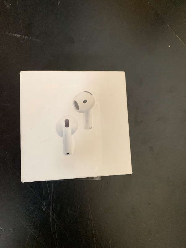 Photo 1 of Apple AirPods 4 Wireless Earbuds, Bluetooth Headphones, with Active Noise Cancellation, Adaptive, Transparency Mode, Personalized Spatial Audio, USB-C Charging Case, Wireless Charging, H2 Chip