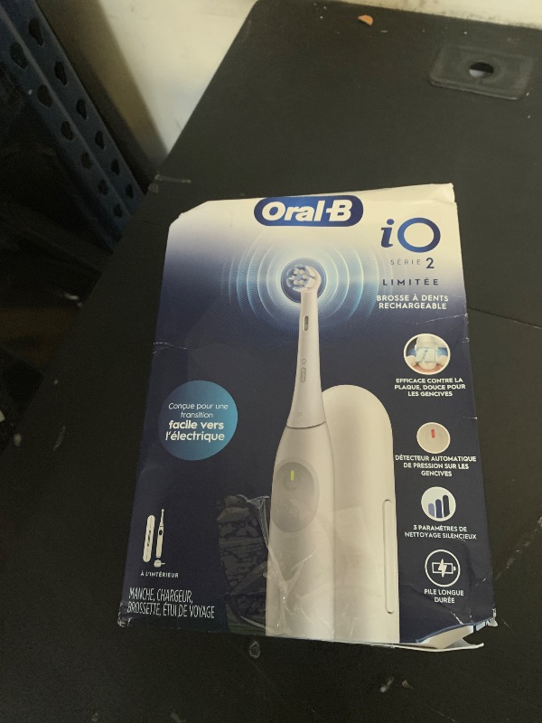 Photo 1 of Oral-B Rechargeable Electric Toothbrush, iO Limited Simple Clean, 3 Cleaning Modes, Automatic Pressure Sensor to Protect Gums, Travel Case, White