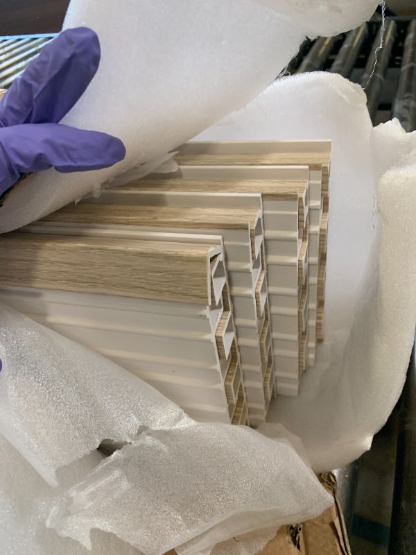 Photo 1 of LARWORKS WPC Slat Wall Panels 8 Pack 96" x 8.2", Waterproof Fluted Wall Paneling, Accent 3D Wall Panel for Wall Decor, Bathroom, Bedroom, Office - Widen Low Grille Elm (Cover Approx.44 sq.ft)
