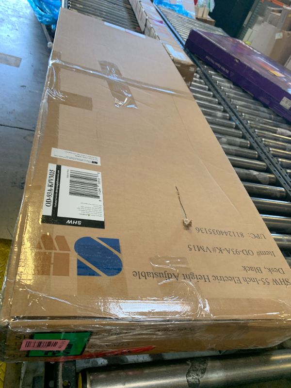 Photo 1 of SHW 55 x 28 Inches Electric Height Adjustable Standing Desk with Drawer and Memory Preset, Black