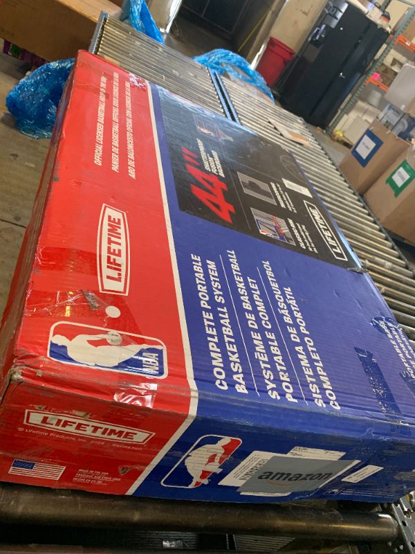 Photo 1 of Lifetime NBA League Edition Portable Basketball Hoop, Adjustable Height 7.5-10 Ft, 44 Inch Shatterproof Fusion Backboard, Base with Wheels
