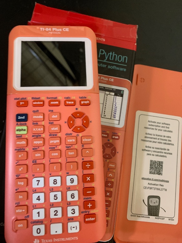 Photo 1 of Texas Instruments TI-84 Plus CE Color Graphing Calculator, Coral (Metallic)