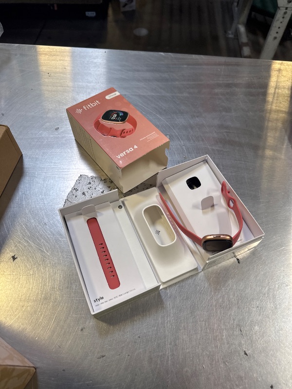 Photo 1 of Fitbit Versa 4 Fitness Smartwatch with Daily Readiness, GPS, 24/7 Heart Rate, 40+ Exercise Modes, Sleep Tracking and more, Pink Sand/Copper Rose, One Size (S & L Bands Included)