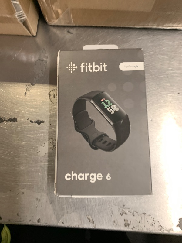 Photo 1 of Fitbit Charge 6 Fitness Tracker with Google apps, Heart Rate on Exercise Equipment, 6-Months Premium Membership Included, GPS, Health Tools and More, Obsidian/Black, One Size (S & L Bands Included)