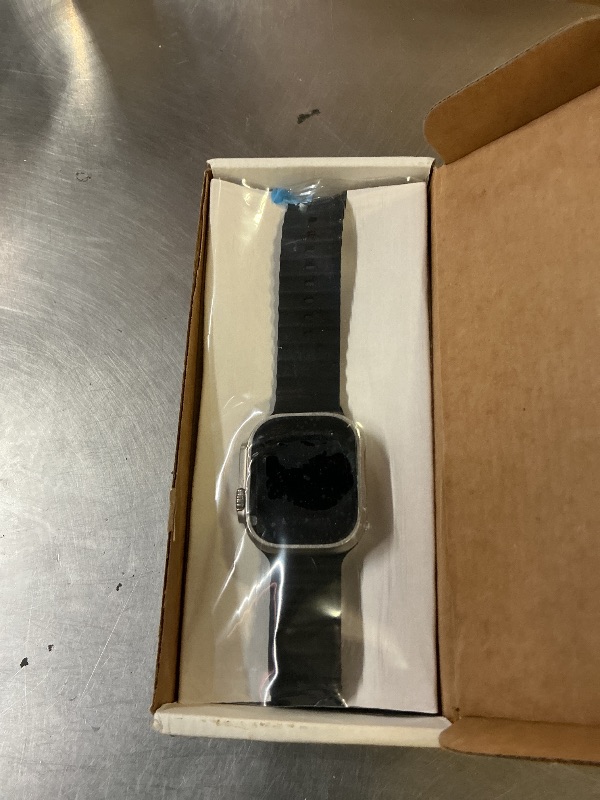 Photo 1 of Apple Watch Ultra [GPS + Cellular 49mm] Titanium Case with Midnight Ocean Band, One Size (Renewed)