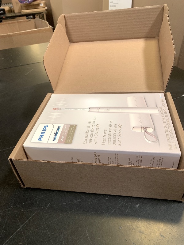 Photo 1 of Philips Sonicare DiamondClean Prestige 9900 Rechargeable Electric Toothbrush with SenseIQ, 5 Premium All-in-One Brush Heads, Plaque Removal, Gum Care, Whitening, Champagne, BD9001AZ