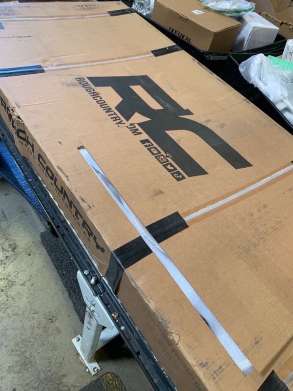 Photo 1 of Rough Country Hard Low Profile Tri-Fold Tonneau Cover for Chevy Silverado & GMC Sierra 1500 (2019–2026) – Flush Mount Aluminum Bed Cover, Fits 5'10 Short Bed