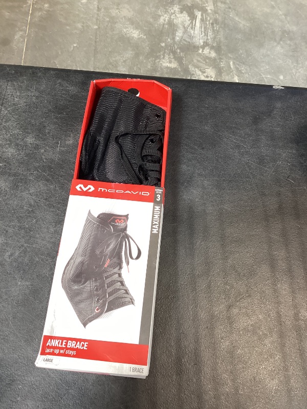 Photo 1 of McDavid Ankle Brace with Lace-Up & Stays, Maximum Support, Comfortable Compression & Breathable Design