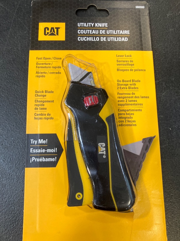 Photo 1 of Cat Safety Squeeze Utility Knife, Retractable Blade with Trigger Grip, Quick Change Blade Storage, Includes 3 Round Point Safety Blades – 980080