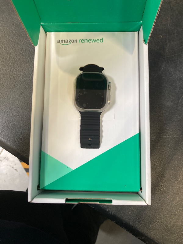 Photo 1 of Apple Watch Ultra [GPS + Cellular 49mm] Titanium Case with Midnight Ocean Band, One Size (Renewed Premium)