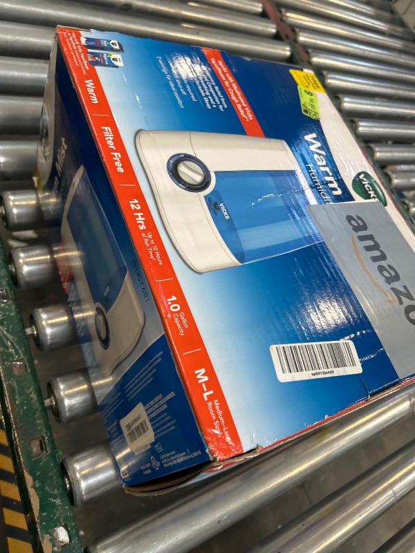 Photo 1 of Vicks Warm Mist Humidifier Filter-Free 1-Gal Tank, Auto Shut-Off, Night Light, VapoPad and VapoSteam Compatible