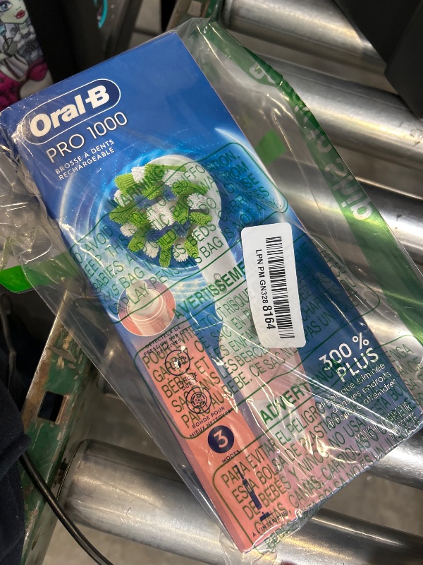 Photo 1 of Oral-B Pro 1000 Rechargeable Electric Toothbrush, Pink
