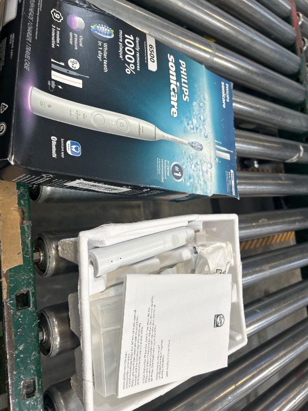 Photo 1 of Philips Sonicare 6500 Series Electric Toothbrush - Next-Generation Sonicare Technology, Pressure Sensor, 9 Brushing Settings, SmarTimer, BrushPacer, 21-Day Runtime, Travel Case, White, HX7410/10