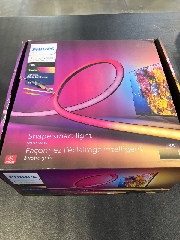 Photo 1 of Philips Hue Play Gradient 65" Smart TV Light Strip, Flowing Color-Changing LED Strip Lights, Multicolor TV Backlight Sync with Music and Gaming, Requires Bridge & Sync Box, Control with App and Voice