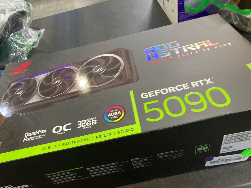 Photo 1 of ASUS ROG Astral GeForce RTX™ 5090 OC Edition Graphics Card, NVIDIA (PCIe® 5.0, 32GB GDDR7, HDMI®/DP 2.1, 3.8-Slot, 4-Fan Design, Axial-tech Fans, Patented Vapor Chamber, Phase-Change GPU Thermal Pad)