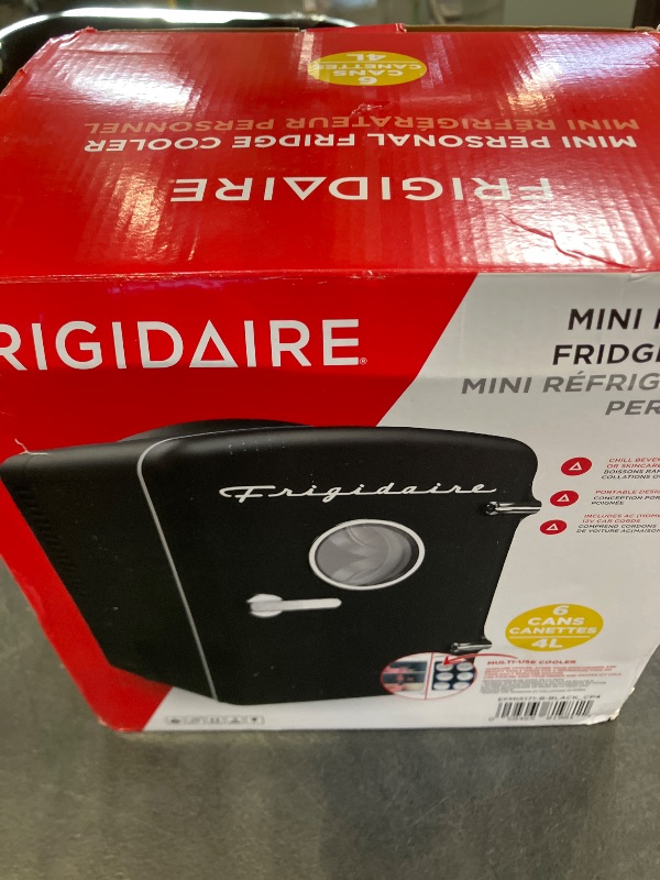 Photo 1 of Frigidaire EFMIS171 Retro Mini Portable Personal Fridge - Ideal for Home, Office or Dorm - Includes Carrying Handle, AC/DC Wall/Car Charger