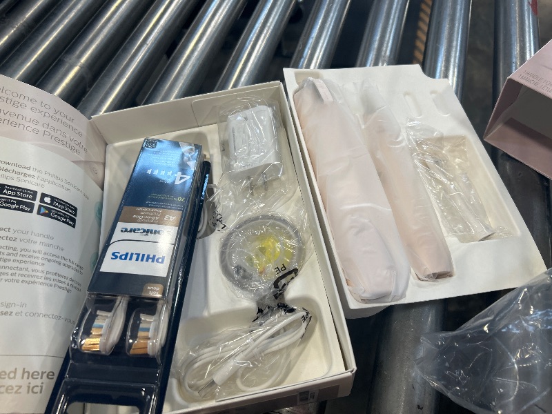 Photo 1 of Philips Sonicare DiamondClean Prestige 9900 Rechargeable Electric Toothbrush with SenseIQ, 5 Premium All-in-One Brush Heads, Plaque Removal, Gum Care, Whitening, Champagne, BD9001AZ