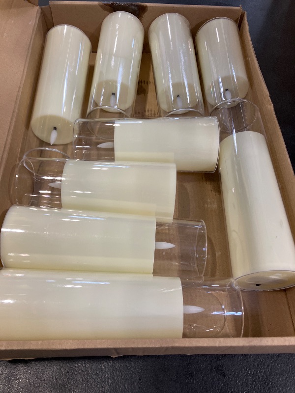 Photo 1 of kakoya Flickering Flameless Candles Battery Operated with Remote and 2/4/6/8 H Timer Acrylic Led Pillar Candles Pack of 9 (appr D2.3"xH5.5"6.5"7.5")with Realistic 3D Wick Candles for Home Decor(White)