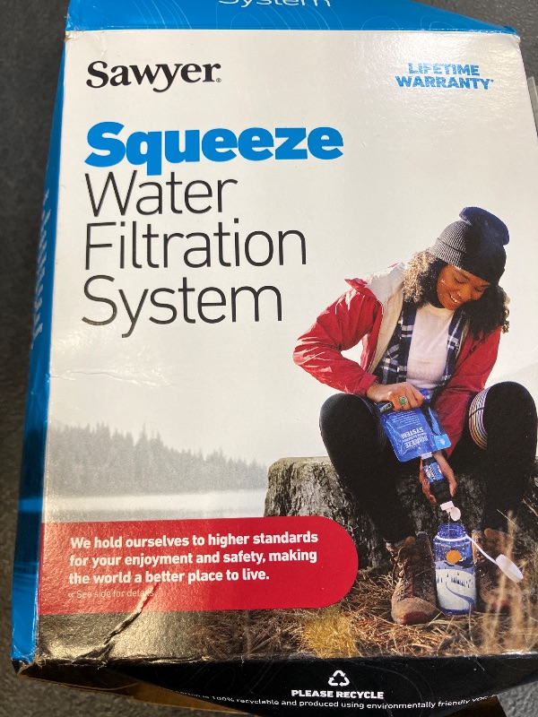 Photo 1 of Sawyer Products SP129 Squeeze Water Filtration System w/Two 32-Oz Squeeze Pouches, Straw, and Hydration Pack Adapter