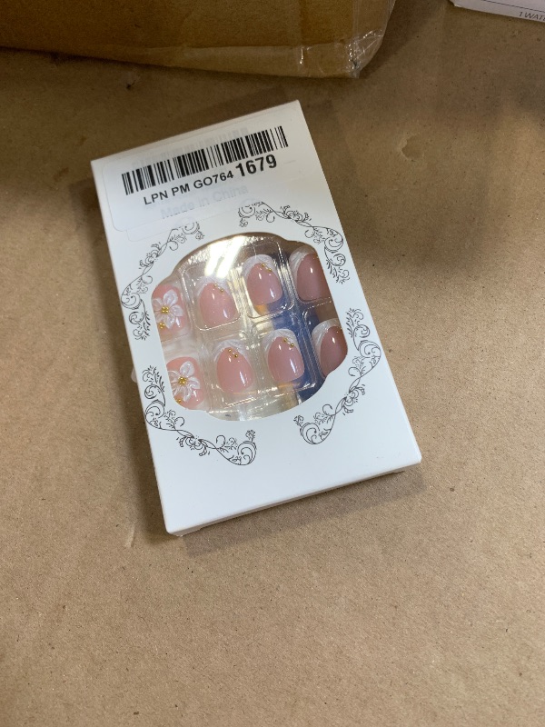 Photo 1 of Square Press on Nails Medium Fake Nails with 5D Flower Charm Design Glossy White French Tips Acrylic Nail Leopard Prints False Nail Reusable Cute Ombre Brown Nail Press ons for Women Manicure 24Pcs