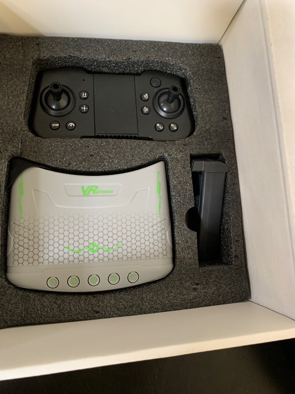 Photo 1 of VR FPV Drone, Experience First-Person View Flight, Comes With a VR Goggle Kit and Remote Controller. The Drone Features a Full Propeller Protection Guard and Collision-Resistant Structure, Making It Easy to Operate and Perfect for Beginners. Equipped With