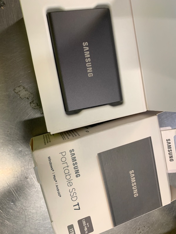 Photo 1 of Samsung T7 Portable SSD, 1TB External Solid State Drive, Speeds Up to 1,050MB/s, USB 3.2 Gen 2, Reliable Storage for Gaming, Students, Professionals, MU-PC1T0T/AM, Gray
