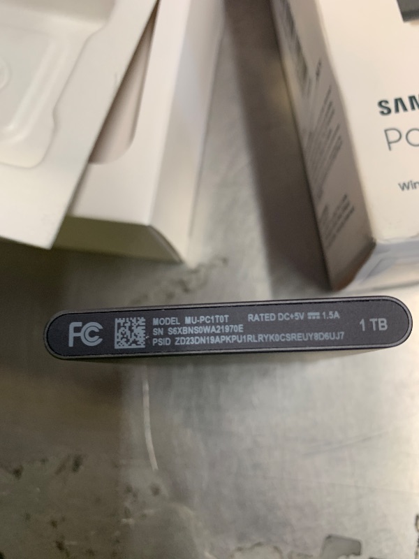 Photo 1 of Samsung T7 Portable SSD, 1TB External Solid State Drive, Speeds Up to 1,050MB/s, USB 3.2 Gen 2, Reliable Storage for Gaming, Students, Professionals, MU-PC1T0T/AM, Gray