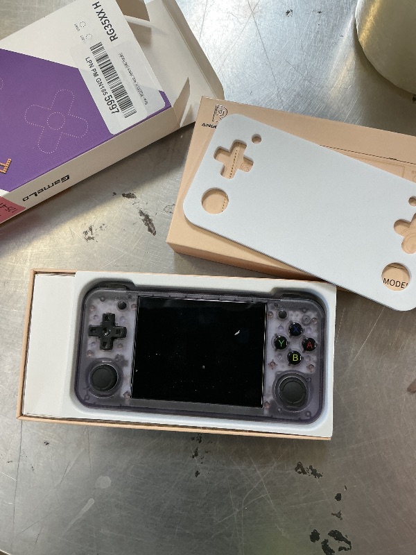 Photo 1 of RG35XX H, Anbernic Retro Handheld Gaming Console with 64GTF Card, Dual Joystick Design 3.5-inch HD Screen Lasts up to 8 Hours High-Capacity Battery for Better Experience (64G Purple)