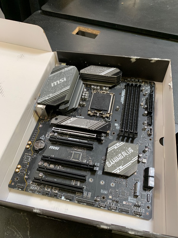 Photo 1 of MSI B760 Gaming Plus WiFi Gaming Motherboard (Supports 12th/13th/14th Gen Intel Processors, LGA 1700, DDR5, PCIe 4.0, M.2, 2.5Gbps LAN, USB 3.2 Gen2, HDMI/DP, Wi-Fi 6E, Bluetooth 5.3, ATX)