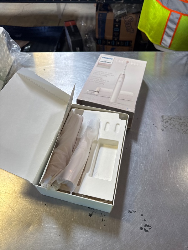 Photo 1 of Philips Sonicare DiamondClean 9900 Prestige Electric Toothbrush - with SenseIQ Technology and Advanced AI App, 5 Brushing Modes, 3 Intensity Levels, Charging Travel Case, Champagne, HX9990/11