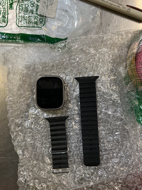 Photo 1 of Apple Watch Ultra 49MM titanium with no charger
