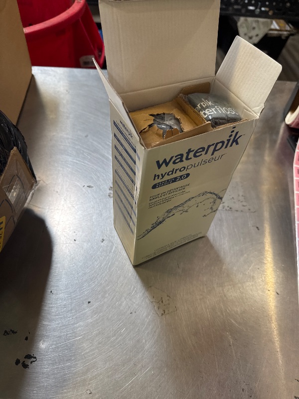Photo 1 of Waterpik Cordless Advanced 2.0 Water Flosser For Teeth, Gums, Braces, Dental Care With Travel Bag and 4 Tips, ADA Accepted, Rechargeable, Portable, and Waterproof, Blue WP-583, Packaging May Vary