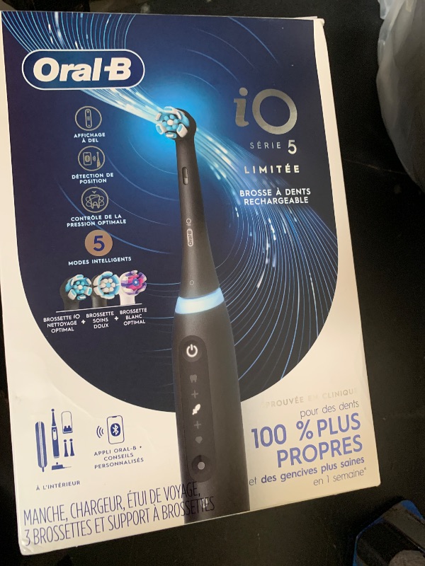 Photo 1 of Oral-B Rechargeable Electric Toothbrush, iO5 Limited Deep Clean & Whiten, 5 Cleaning Modes, Visual Pressure Sensor to Protect Gums, Travel Case, 3 Brush Heads, Black