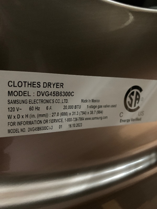 Photo 1 of ***HEAVILY USED MAJOR DAMAGE***
Samsung 7.5 Cu. Ft. Brushed Black Front Load Gas Dryer