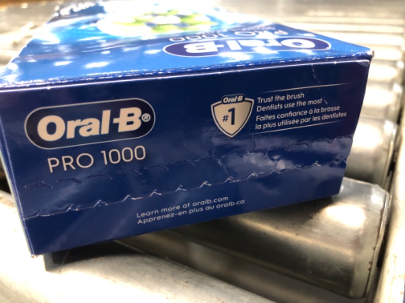 Photo 1 of ***FACTORY SEALED*** Oral-B Pro 1000 CrossAction Electric Toothbrush, Green