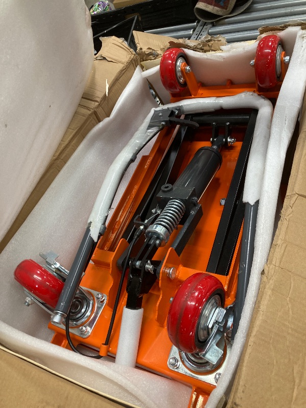 Photo 1 of *Used/Scratches* Garvee Hydraulic Lift Table Cart, 1100lbs Capacity 35.4" Lifting Height, Manual Single Scissor Lift Table with 4 Wheels and Non-Slip Pad, Hydraulic Scissor Cart for Material Handling, Orange