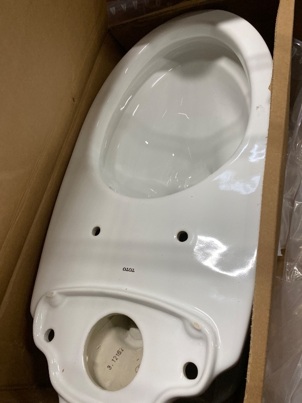 Photo 1 of ***Only tank enclosed*** TOTO® Drake® Two-Piece Elongated 1.28 GPF Universal Height TORNADO FLUSH ® Toilet with 12 Inch Rough-In, CEFIONTECT®, and SoftClose® Seat, WASHLET®+ Ready, Cotton White - MS776124CEFG.10#01