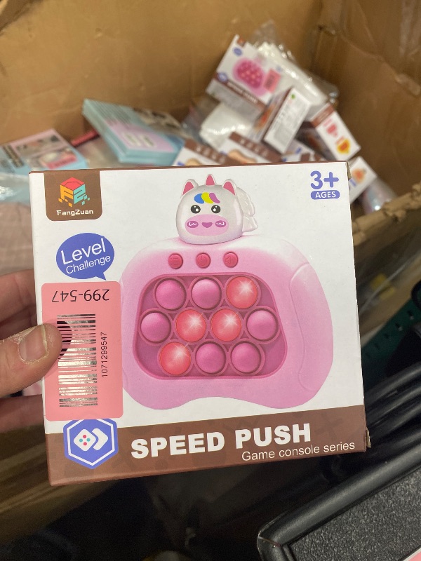 View 1 of **PINK UNICORN**Christmas Quick Push Game Fidget Toys for 5-7 Kids, Multiplayer Handheld Game Fast Puzzle Toys for Girls, Birthday Party Favors Gifts, Gifts for 6 7 8 9 10 11 12 Years Old Kids Boys