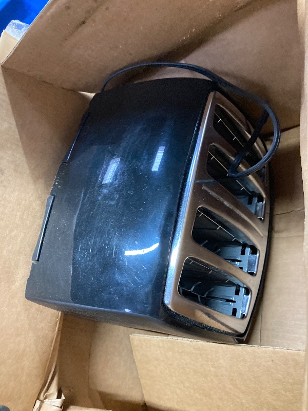 Photo 1 of **ONLY ONE SIDE WORK***BLACK+DECKER 4-Slice Toaster, TR1410BD, Extra-Wide, 7 Shade Settings, Crumb Trays, Gloss Black