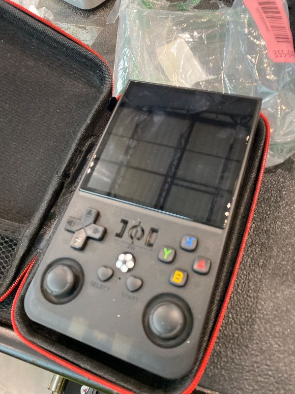 Photo 1 of **UNTESTED**
R36MAX Retro Gaming Console, 4.0 Inch Handheld Game Console with 64GB Classic Video Games Inchluded,Support 30+ Simulators,Hand Held Game Console for Christmas (Black)