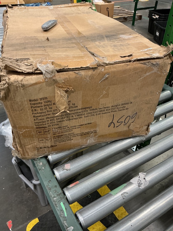 Photo 1 of **UNTESTED**
VEVOR Hydraulic Lift Table Cart, 330 lbs Load Capacity, 50-Inch Lifting Height, Manual Single Scissor Lift Table with Non-Slip Pad and 4 Wheels, Orange, Alloy Steel