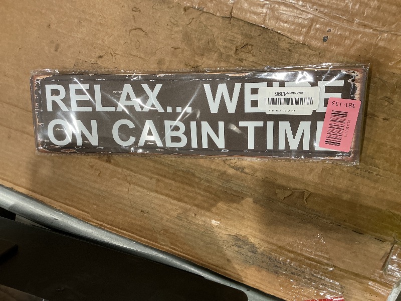 Photo 1 of "Relax We're on Cabin Time" Hanging Metal Sign - Rustic Lodge & Log Home Decor 16x4 Inch - Vintage Style Wall Plaque for Porch, Outhouse or Cabin - Tin Wall Art
