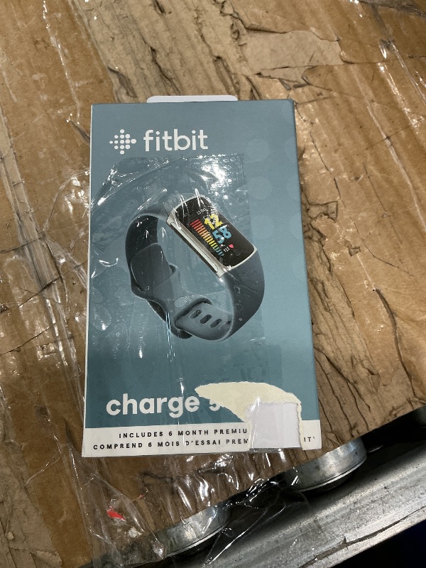 Photo 1 of ***NOT TURNING ON*** Fitbit Charge 5 Advanced Fitness Tracker with GPS, Heart Rate, Sleep & Health Tracker - Power Bundle with Adapter (Blue Stainless Steel)