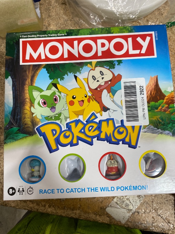Photo 1 of **MISSING 2 FIGURES** Monopoly Pokémon Edition Board Game